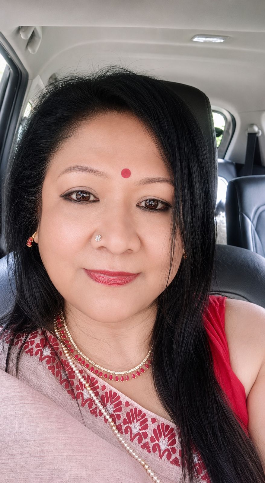 Dr. Lakhimi Dutta